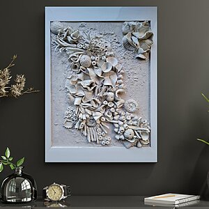 framed 3D wall art collage made of clay, white colour scheme